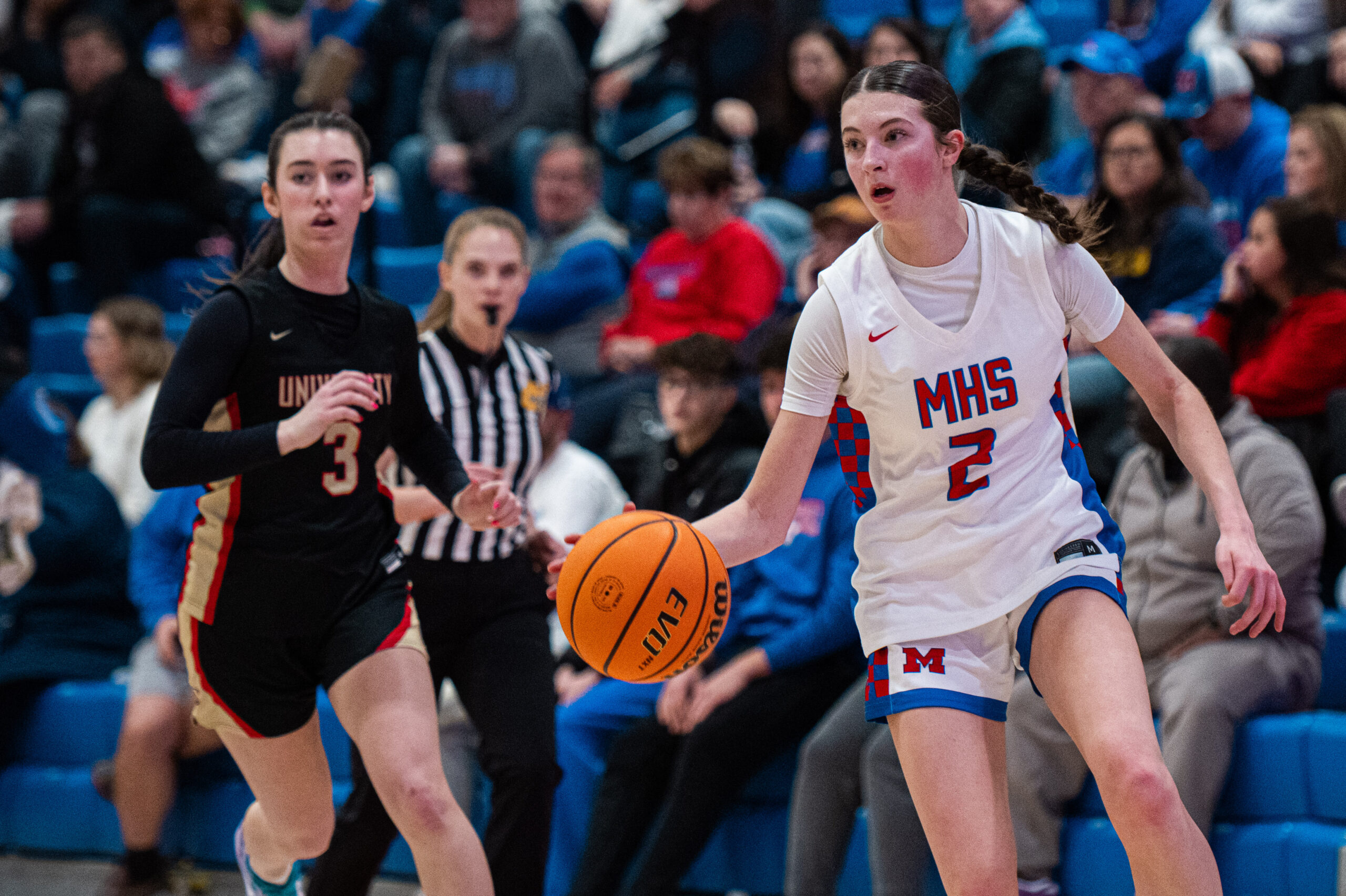 Freshman Maddie Ancell leaves her mark against University High, as Mohigans roll rivals